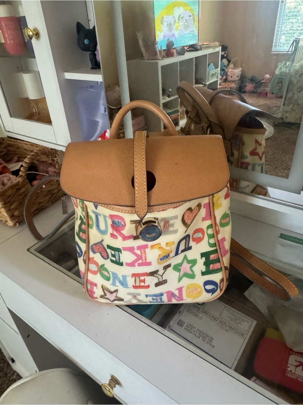 Dooney & Bourke Multicolor Letter Print Mini Backpack with Tan Trim